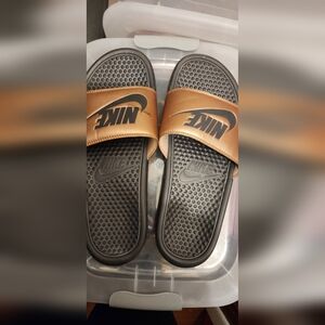 Gold women's Nike slides